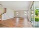 Bright and spacious living room with hardwood floors and sliding glass doors at 5825 1/2 S 5Th St, Tampa, FL 33611