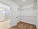 Large walk-in closet with wire shelving at 5825 1/2 S 5Th St, Tampa, FL 33611