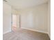 Spacious bedroom with neutral colored walls and carpet at 5825 1/2 S 5Th St, Tampa, FL 33611