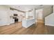 Modern kitchen with white cabinets, stainless steel appliances and quartz countertop at 5825 1/2 S 5Th St, Tampa, FL 33611