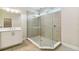 Bathroom with a large walk-in shower and modern fixtures at 5825 1/2 S 5Th St, Tampa, FL 33611