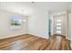 Bright dining room with contemporary chandelier and hardwood floors at 5825 S 5Th St, Tampa, FL 33611