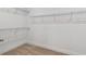Walk-in closet complete with shelving for maximum storage space at 5825 S 5Th St, Tampa, FL 33611