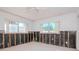 A bedroom under renovation, showing exposed walls and flooring at 603 Virginia Ave, Tarpon Springs, FL 34689