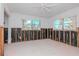 A bedroom needing renovation, showing exposed walls and flooring at 603 Virginia Ave, Tarpon Springs, FL 34689