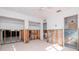 A large bedroom with exposed framing and plumbing during renovation at 603 Virginia Ave, Tarpon Springs, FL 34689