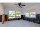 Room under renovation with new flooring and wall framing at 603 Virginia Ave, Tarpon Springs, FL 34689