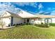 Charming one-story house with landscaping and a covered porch at 6887 Wirevine Dr, Brooksville, FL 34602