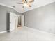 Spacious bedroom with tile floors and neutral walls at 760 Coral Reef Dr, Tampa, FL 33602