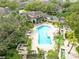 Aerial view of community pool and surrounding landscape at 760 Coral Reef Dr, Tampa, FL 33602