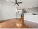 Open living room with hardwood floors and kitchen island at 760 Coral Reef Dr, Tampa, FL 33602