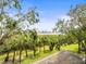 Landscaped grounds with lush greenery and parking area at 760 Coral Reef Dr, Tampa, FL 33602