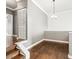 Bright dining room with hardwood floors and modern light fixture at 760 Coral Reef Dr, Tampa, FL 33602