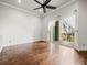 Hardwood floor living room with access to balcony and view at 760 Coral Reef Dr, Tampa, FL 33602