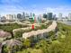 Townhouse community with city skyline in the background at 760 Coral Reef Dr, Tampa, FL 33602
