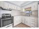 Modern kitchen with stainless steel appliances at 35209 Ada Ave, Zephyrhills, FL 33541