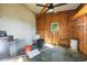 Unfinished workshop with concrete floor and shelving at 35209 Ada Ave, Zephyrhills, FL 33541