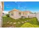 Large backyard with grassy lawn and partial view of house at 11211 60Th Ave, Seminole, FL 33772