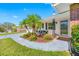 Charming home with manicured lawn, mature palms, and welcoming front entrance at 11211 60Th Ave, Seminole, FL 33772