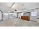Bright and clean garage with lots of room, a work bench, and overhead lighting at 11211 60Th Ave, Seminole, FL 33772