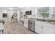 Modern kitchen featuring granite countertops, stainless steel appliances, and ample cabinet space at 11211 60Th Ave, Seminole, FL 33772