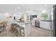 Bright, open kitchen with granite countertops, stainless appliances, and modern finishes at 11211 60Th Ave, Seminole, FL 33772