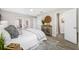 Calm main bedroom featuring neutral decor, decorative rug, and natural light at 11211 60Th Ave, Seminole, FL 33772