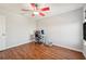 Home office with wood flooring and ceiling fan at 1730 Bonita Bluff Ct, Ruskin, FL 33570