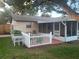 Fenced patio area with garden and seating at 1751 St Anthony Dr, Clearwater, FL 33759