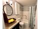 Clean bathroom with tub and shower, updated vanity, and new fixtures at 2257 World Parkway W Blvd # 39, Clearwater, FL 33763