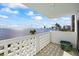 A private balcony view of the bay waters, downtown skyline and palm trees on a sunny day at 2401 Bayshore Blvd # 410 & 510, Tampa, FL 33629