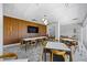 Bright community room featuring tables and chairs, perfect for gatherings at 2401 Bayshore Blvd # 410 & 510, Tampa, FL 33629