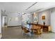 Mid-century modern dining room with a wood table and unique spiral staircase at 2401 Bayshore Blvd # 410 & 510, Tampa, FL 33629