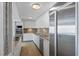 Bright kitchen featuring stainless steel appliances, granite counters, and ample cabinet space at 2401 Bayshore Blvd # 410 & 510, Tampa, FL 33629