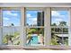 A breathtaking view of the pool, bay, and city skyline from the comfort of your living space at 2401 Bayshore Blvd # 410 & 510, Tampa, FL 33629