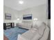 Relaxing living room with reclining sofas and modern decor at 301 1St S St # 2203, St Petersburg, FL 33701