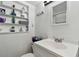 Bright bathroom with a white vanity and decorative shelves at 4129 36Th N Ave, St Petersburg, FL 33713