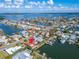 Bird's eye view of waterfront home with private dock and canal access at 425 Capri Blvd, Treasure Island, FL 33706