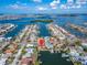 Aerial view showcasing a waterfront property with boat access at 425 Capri Blvd, Treasure Island, FL 33706