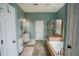 Large bathroom with double vanity, garden tub, and shower at 511 Crowned Eagle Ct, Valrico, FL 33594