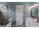 Elegant bathroom with dual vanity, a shower, and a toilet at 511 Crowned Eagle Ct, Valrico, FL 33594