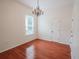 Bright bedroom with hardwood floors and ample natural light at 511 Crowned Eagle Ct, Valrico, FL 33594
