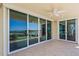 Spacious balcony with sliding doors and water views at 795 Collany Rd # 304, St Petersburg, FL 33715