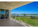 Relaxing balcony with gorgeous water views and lush greenery at 795 Collany Rd # 304, St Petersburg, FL 33715