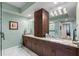 Double vanity with granite countertop and ample storage at 795 Collany Rd # 304, St Petersburg, FL 33715