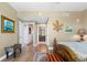 Elegant Primary bedroom with ensuite bathroom and hardwood floors at 795 Collany Rd # 304, St Petersburg, FL 33715