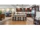 Spacious kitchen featuring granite countertops and dark wood cabinets at 795 Collany Rd # 304, St Petersburg, FL 33715