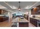 Open concept kitchen with island and living area with water views at 795 Collany Rd # 304, St Petersburg, FL 33715