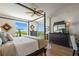 Luxurious main bedroom, featuring a king-size bed and water views at 795 Collany Rd # 304, St Petersburg, FL 33715