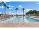 Large community pool with plenty of lounge chairs at 8420 Maybelle Dr, Weeki Wachee, FL 34613